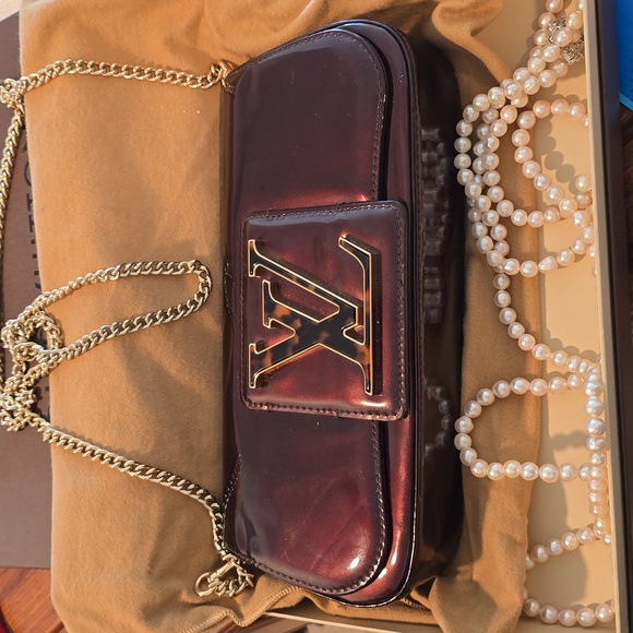 LOUIS VUITTON Sobe Wine red patent clutch bag - Picture 1 of 17
